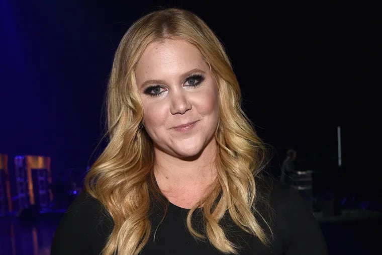 Actress Amy Schumer poses with the "CinemaCon Breakthrough Performer of the Year Award" at The CinemaCon Big Screen Achievement Awards.