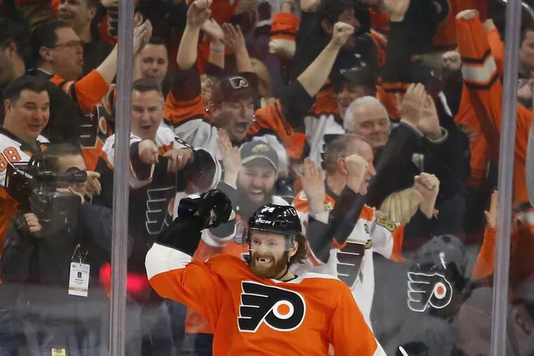 Flyers center Sean Couturier celebrates his overtime goal against the Toronto Maple Leafs on Thursday.