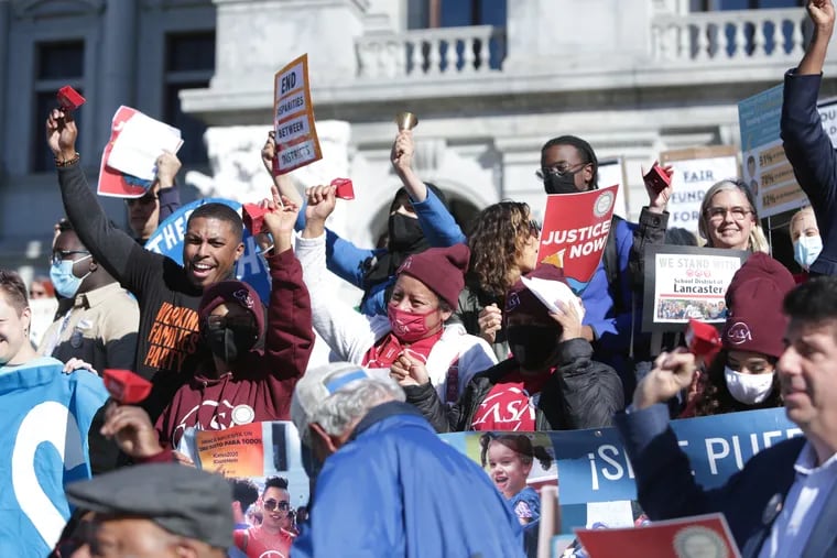 Supporters of a lawsuit challenging how Pennsylvania funds public education rally on the steps of the Capitol Building in Harrisburg on the first day of trial in November.