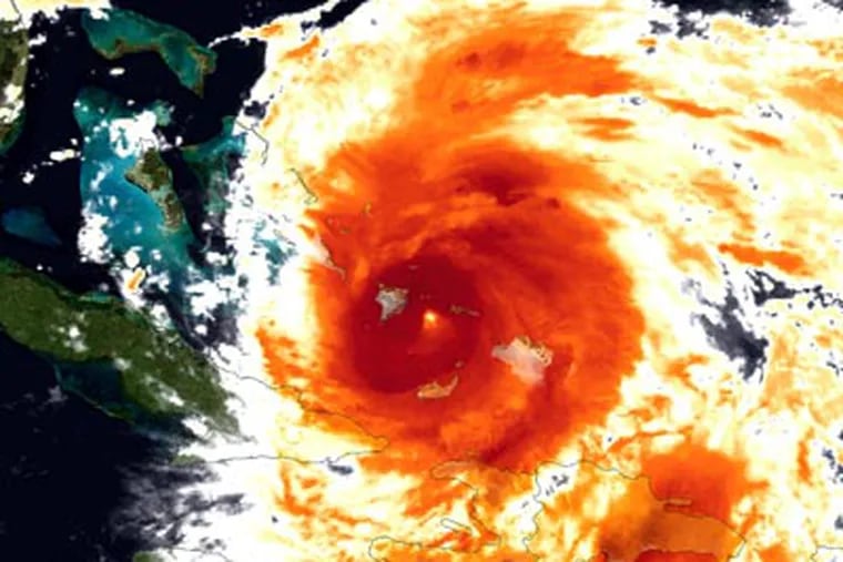 Hurricane Irene as it approached the East Coast last week - in an infrared colorized view provided by NOAA. (AP Photo/NOAA)