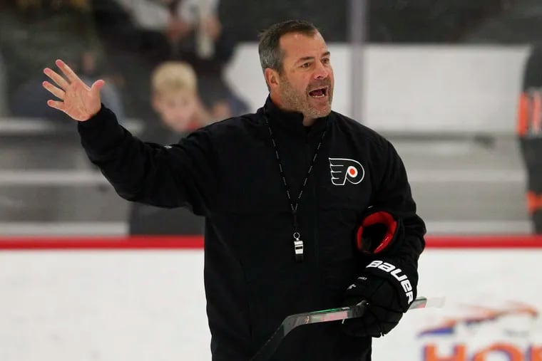 New Flyers coach Alain Vigneault, shown at training camp, is not a big fan of morning skates.