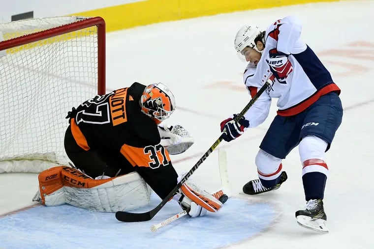 Brian Elliott makes a save on a shot by the Capitals' T.J. Oshie during the third period.
