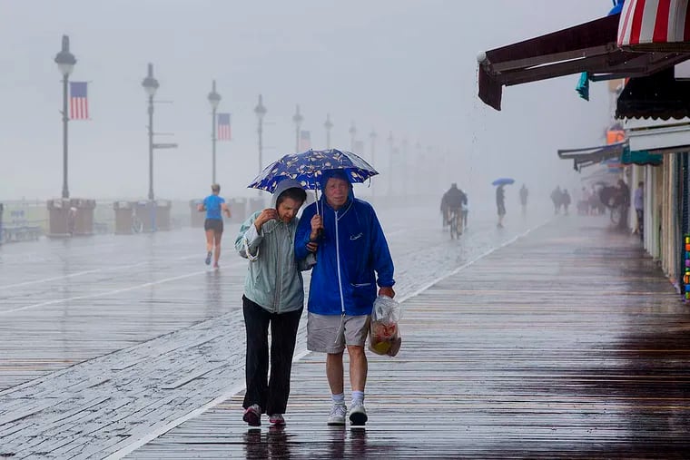 Margie (left) and Jack McKenna take a stroll on the boardwalk in Ocean City, New Jersey, on this rainy Memorial Day, Monday, May 30th, 2016. Margie said, "Any day is a good day at the beach!"