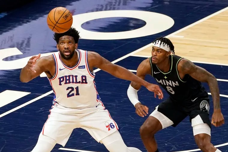 Joel Embiid, left, delivered 37 points and 11 rebounds in the Sixers' win
