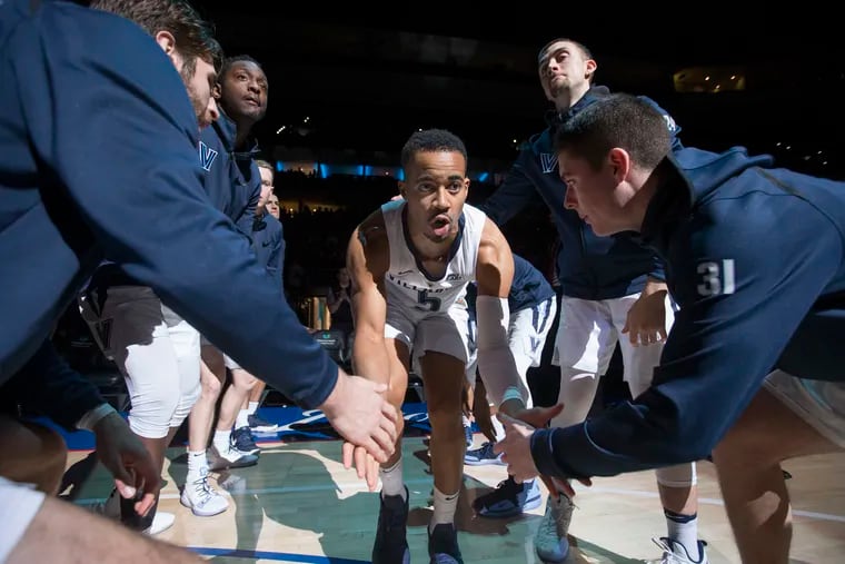 “The guys always migrate to him,” Villanova coach Jay Wright said of Phil Booth.