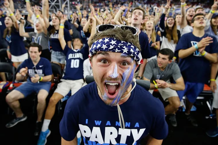 A Villanova student pumps up the crowd before Monday's title game against North Carolina.