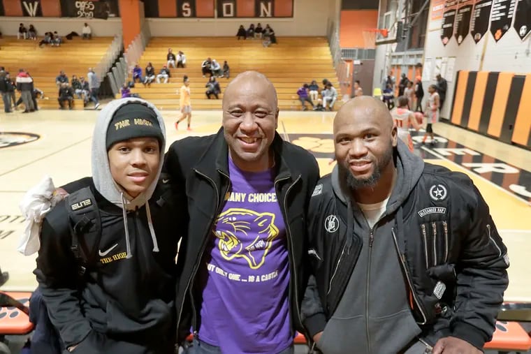 D.J. Wagner, Milt Wagner and Dajuan Wagner after the Simon Gratz vs. Camden boys basketball game at Woodrow Wilson H.S. in 2019.