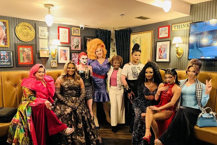 White House Press Secretary Karine Jean-Pierre with the season-nine cast of "RuPaul's Drag Race All-Stars" at the Little Gay Pub in Washington.