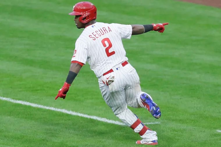Phillies second baseman Jean Segura celebrates Thursday after delivering a game-winning single in his team's 3-2 opening-day win over the Atlanta Braves at Citizens Bank Park.