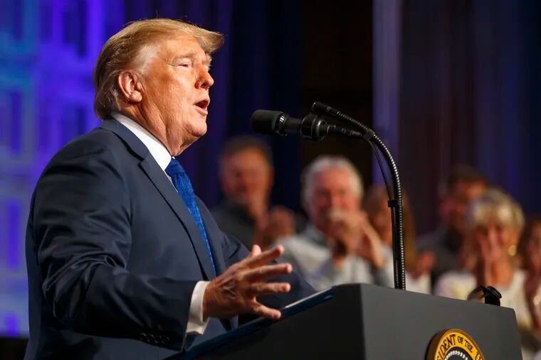 President Donald Trump addresses the National Electrical Contractors Association at the Pennsylvania Convention Center Oct 2. Trump must court suburban voters in Pennsylvania and elsewhere to win a second term, the writer says.