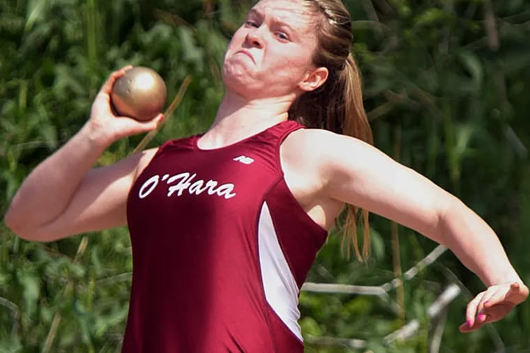 Cardinal O'Hara's Kim Whelan throws the shot put en route to finishing
second in the event, helping the Lions earn the girls' team title. (Lou Rabito/Staff)