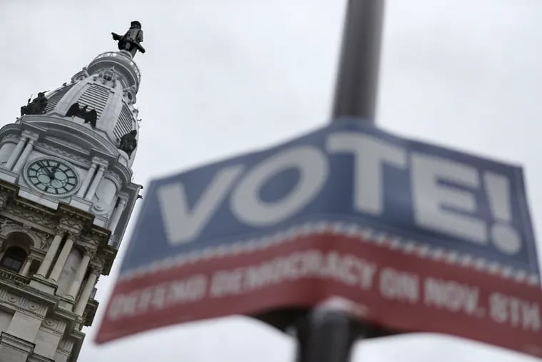 A sign reminding people to vote hanging across from Philadelphia City Hall earlier this month.