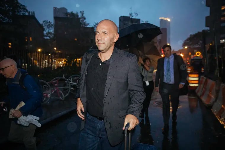 David Correia leaves Federal Court in New York City after his appearance Wednesday. The Florida man, accused of conspiring with associates of Rudy Giuliani to make illegal campaign contributions, was general manager of a Manayunk restaurant, Bourbon Blue, in the mid-2000s.
