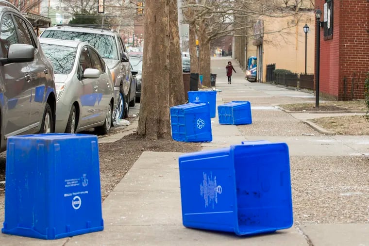 Empty recycling bins line the 4300 block of Walnut in West Philadelphia on Wednesday, Jan. 23, 2019. Half of the recycling pickup in Philadelphia is being incinerated.