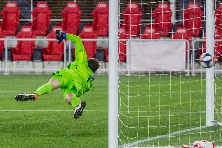 Union goalkeeper Matt Freese couldn't stop Wayne Rooney's smashed penalty kick that won the game for D.C. United in extra time.