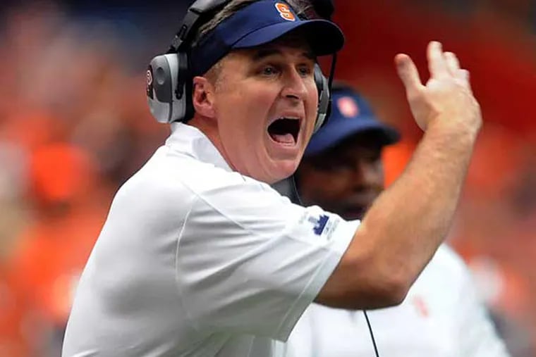 Syracuse head coach Doug Marrone calls out to his players during an
NCAA college football game against Stony Brook, Saturday, Sept. 15,
2012, in Syracuse, N.Y. (AP Photo/The Post-Standard, Frank Ordonez)
