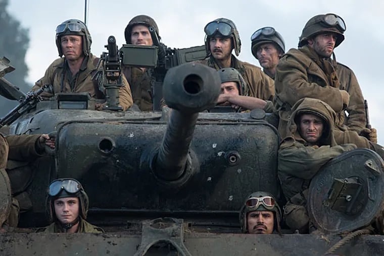 Wardaddy (Brad Pitt) and other soliders in Columbia Pictures' "Fury." (Giles Keyte/MCT)