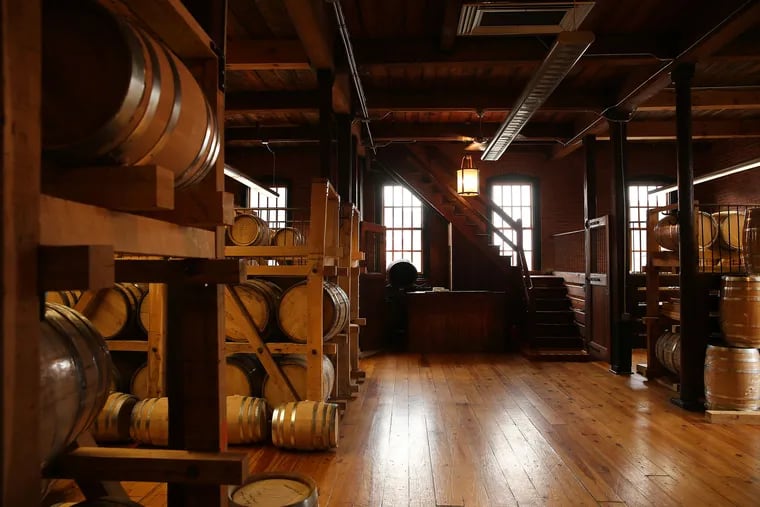 Aging barrels rest on the 2nd floor of New Liberty distillery at 1431 N. Cadwallader Street in Philadelphia.