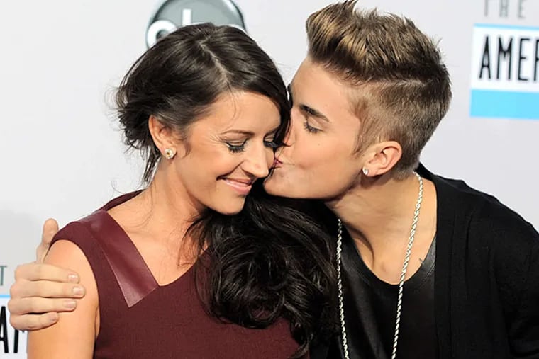 Singer Justin Bieber and mom, Pattie Mallette. (JORDAN STRAUSS / Invision)