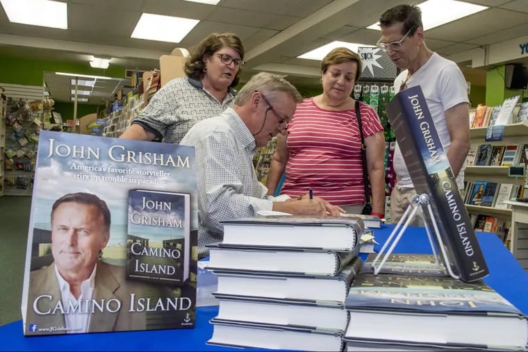 Author John Grisham signs his new novel, “Camino Island,” at the Doylestown Bookshop.