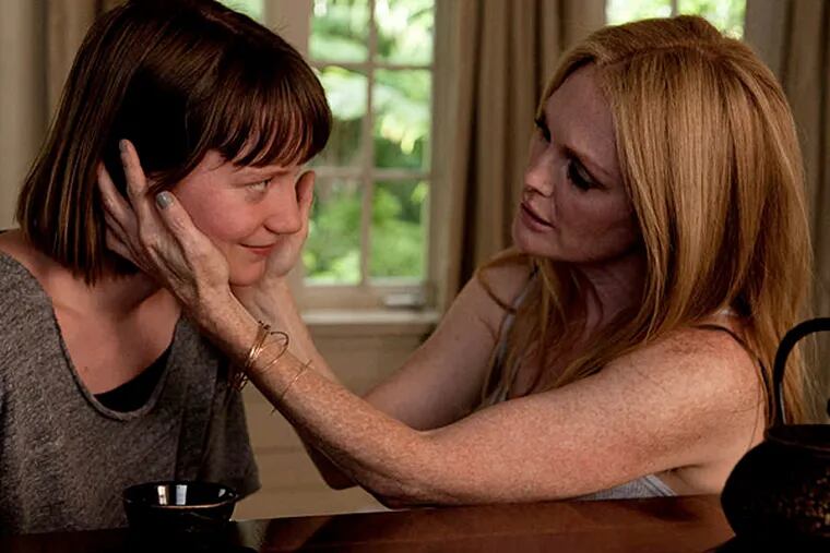 Mia Wasikowska (left) is a stranger who fixes herself to Julianne Moore, an actress trying to re-spark her career, in "Maps to the Stars." (Focus World)