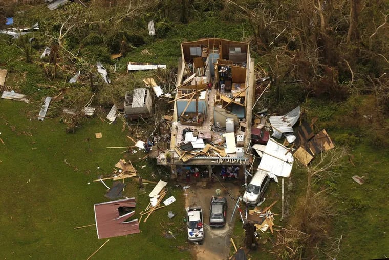 Just one example of the devastation caused by hurricane Maria, shown on Sept. 25, 2017. Nearly one week after hurricane Maria devastated the island of Puerto Rico, residents are still trying to get the basics of food, water, gas, and money from banks. Much of the damage done was to electrical wires, fallen trees, and flattened vegetation, in addition to home wooden roofs torn off.