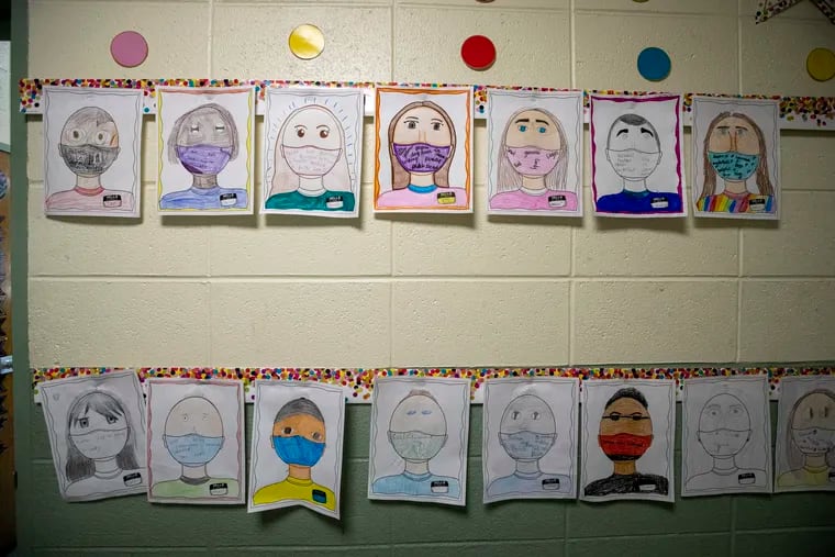Portraits made by students showing themselves with face masks at Nativity of Our Lord School in Warminster on Wednesday, Sept. 23, 2020.