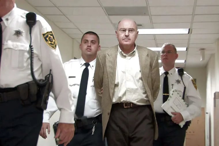 Rafael Robb being led into a pretrial hearing at the Montgomery County Courthouse in 2007.