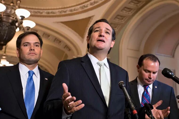 Sen. Ted Cruz is flanked by fellow Republican Sens. Marco Rubio and Mike Lee as they express their frustration after the Senate restored funding for President Obama's health law.