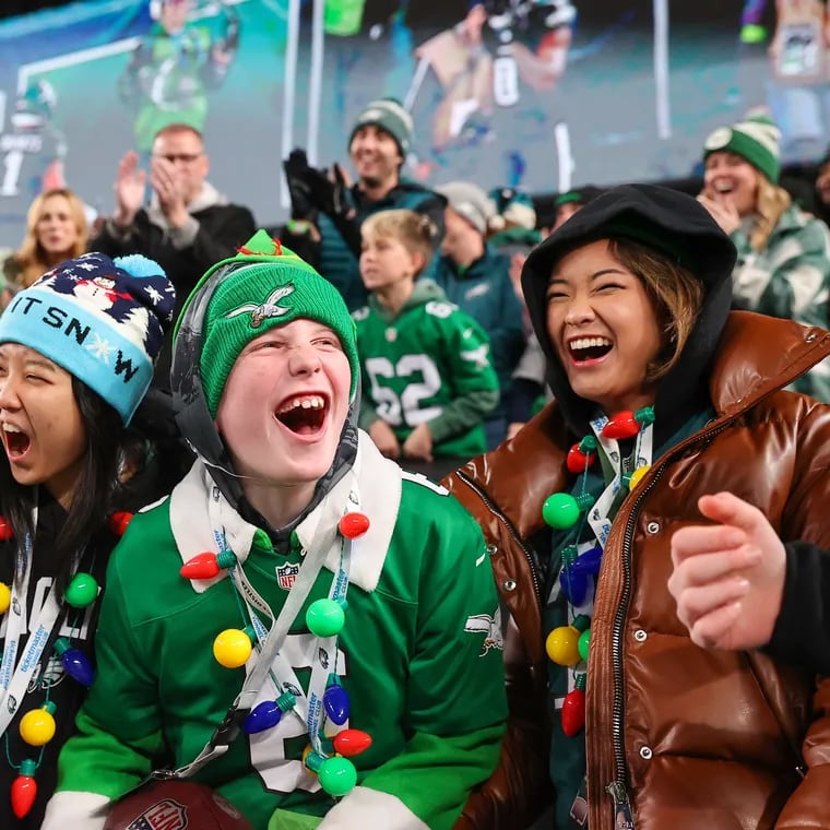 Eagles fans celebrate during their team's Christmas Day win over the Giants back in December.