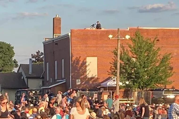 A “tactical officer” with a rifle was placed on a nearby rooftop at an Amish Outlaws concert in William J. Albert Memorial Park on Grove Street.