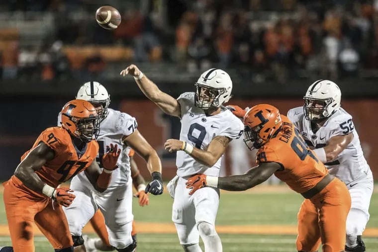 Trace McSorley throws the ball in heavy traffic in the second half of Penn State's win over Illinois.