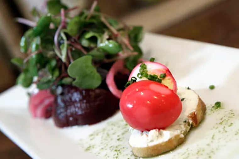 Ann Coll’s pickled quail egg and beet salad, with goat-cheese mousse, at Meritage. Coll has turned from her Asian-fusion training to get in touch with her Lancaster County roots. (ELIZABETH ROBERTSON / Staff Photographer)