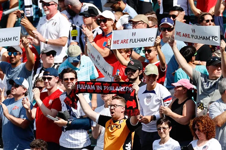 Fulham fans cheer for their team while it played Brentford during an English Premier League game at Lincoln Financial Field.