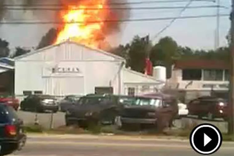 A fire rages after a pair of propane tanks exploded in Glenolden on Wednesday afternoon.