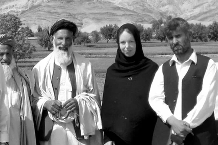 comrubin14-b.jpg Linda Norgrove (second from right) meets with regional Afghan leaders.