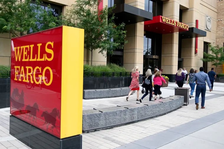 Wells Fargo reported earnings of $2 billion on Wednesday, less than half it made in the same period last year but a significant recovery from last quarter, when it lost $2.4 billion.