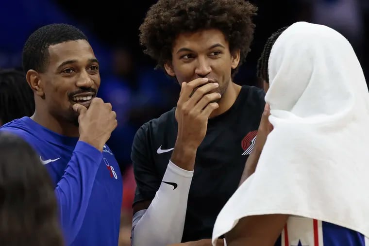 De’Anthony Melton, Matisse Thybulle, and Tyrese Maxey talk after the game between the Portland Trail Blazers and Sixers on Oct. 29.