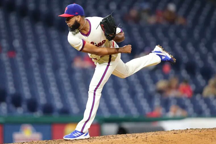 Phillies reliever Seranthony Domínguez  pitching a scoreless eighth inning in his return on Sunday.