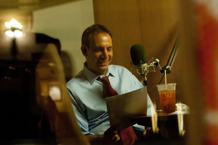 Dave Isay, StoryCorps founder, in a recording booth.