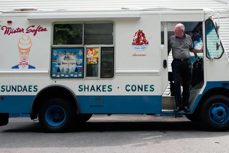 Jim Conway, vice president of Mister Softee Inc., exiting one of those familiar trucks. (MICHAEL PRONZATO / STAFF PHOTOGRAPHER)