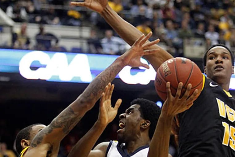 Drexel will have to wait until Sunday to find out whether it will receive an NCAA tournament berth. (Steve Helber/AP)
