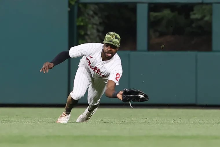 Roman Quinn of the Phillies dives to catch a ball hit by Hanser Alberto of  the Dodgers in the 4th inning on May 20, 2022.
