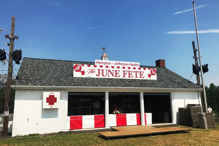 Find red and white, June Fete's signature colors, scattering the grounds of massive country fair.