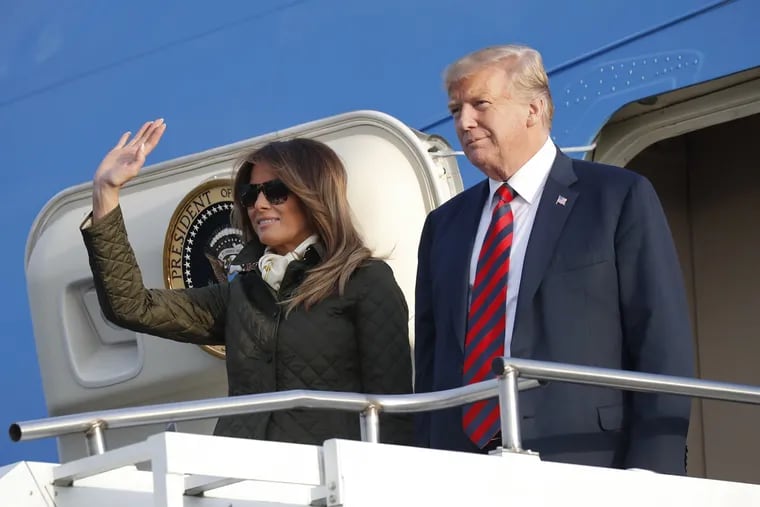 President Donald Trump and first lady Melania Trump during their arrival on Air Force One at Glasgow Prestwick Airport in Scotland, Friday, July 13, 2018.