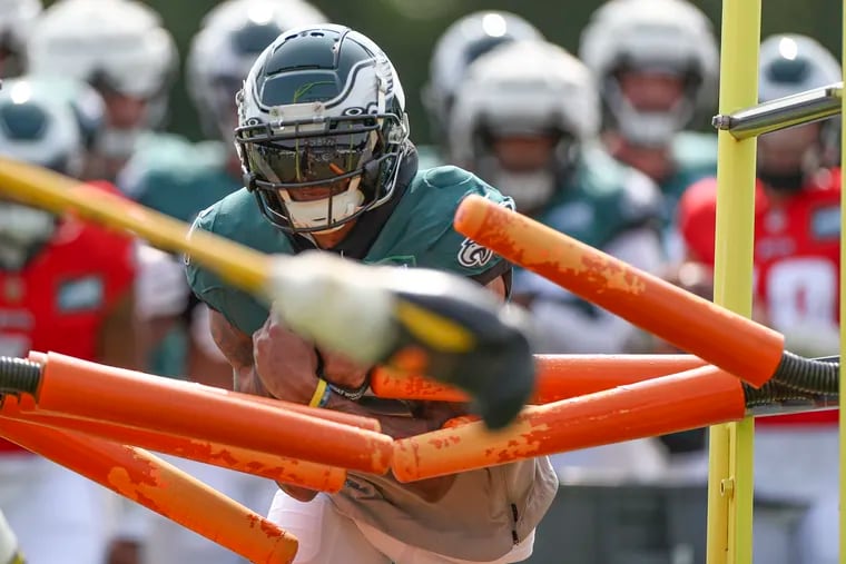 Eagles wide receiver DeVonta Smith running a drill during training camp at the NovaCare Complex on Tuesday.