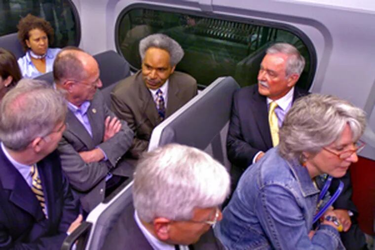 Five suburban Philadelphia mayors share a ride on SEPTA&#0039;s regional rail line with Mayor Street. Clockwise from Street, they are Norm Hawkes of Hatboro, Jayne Young of Lansdowne, Bud Wahl of Ambler, Tom Grady of Narberth, and Dick Yoder of West Chester.