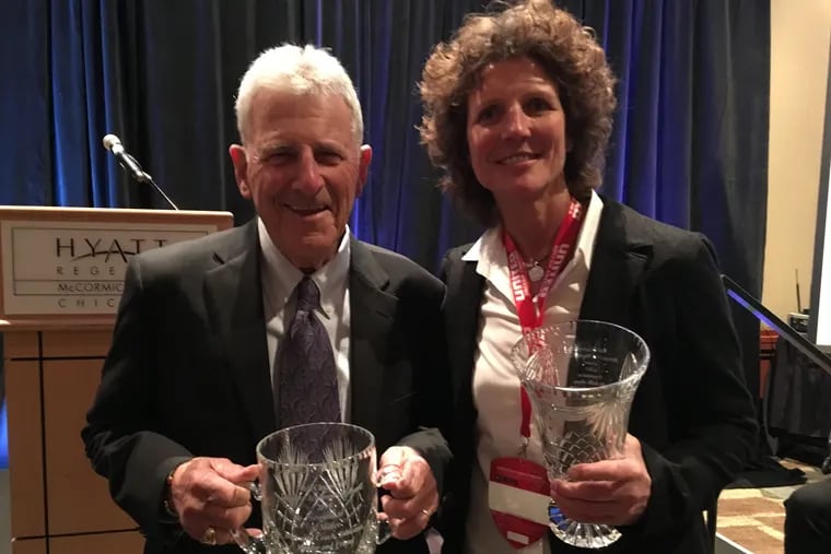Al Miller (left), coach of the 1973 Philadelphia Atoms team that won the North American Soccer League Championship, and U.S. women's national soccer team legend Michelle Akers were honored at the United Soccer Coaches convention's Walt Chyzowych Awards ceremony in Chicago.
