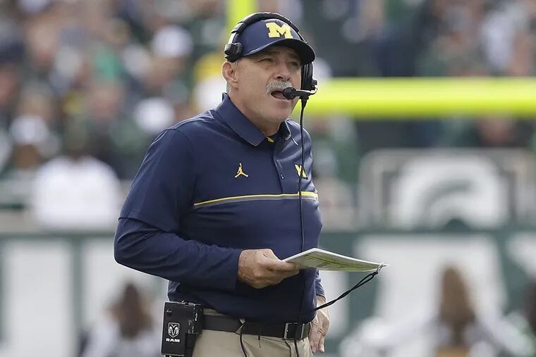 Michigan defensive coordinator Don Brown watches from the sidelines during the second half of a college football game against Michigan State, Saturday, Oct. 29, 2016, in East Lansing, Mich.
