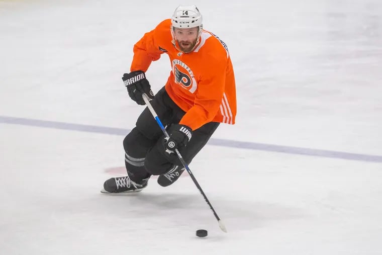 Sean Couturier skates during the first day of Flyers training camp at the Skate Zone in Voorhees, N.J. Thursday, Sept. 23, 2021.